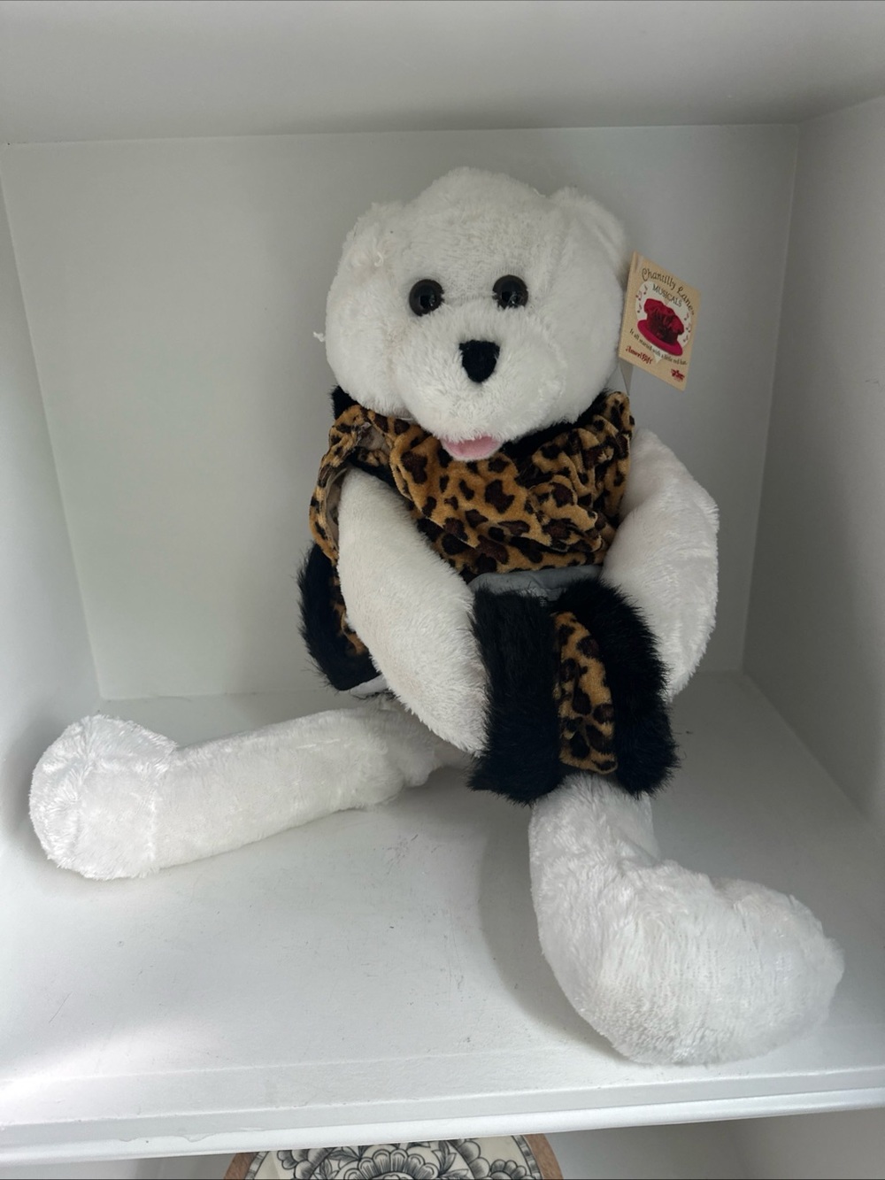 White Plush Bear with Leopard Print Scarf plays Chantelle lace